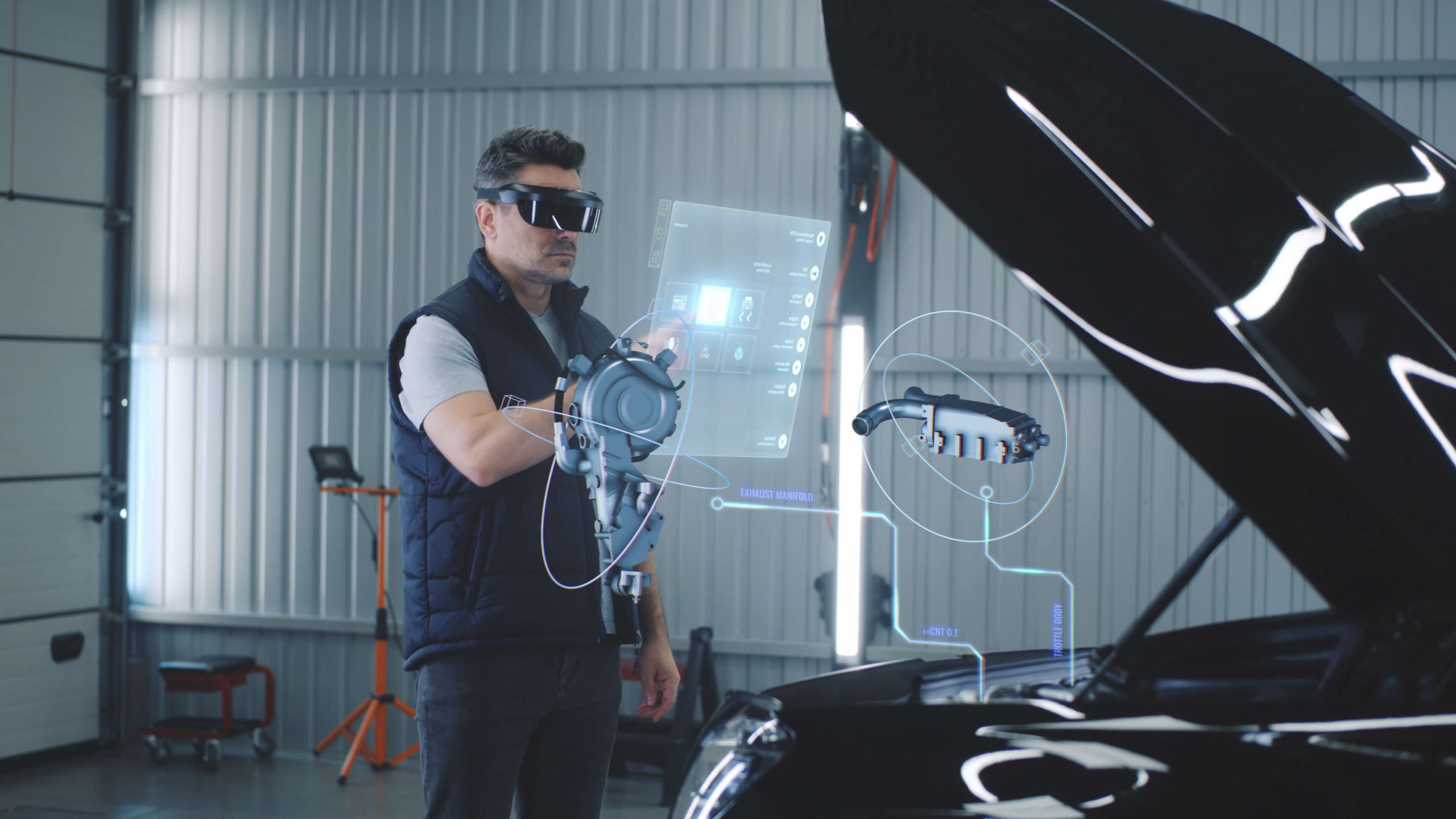 A mechanic or technician using augmented reality glasses to look at the engine bay of a vehicle and perform diagnosis.